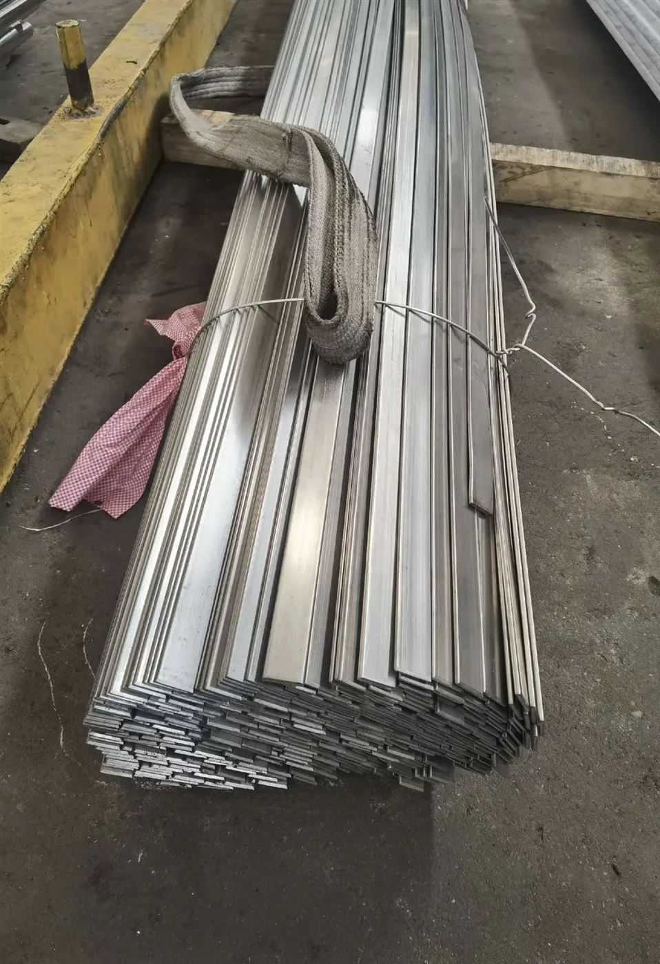 Cold drawn flat steel bar for industrial processing